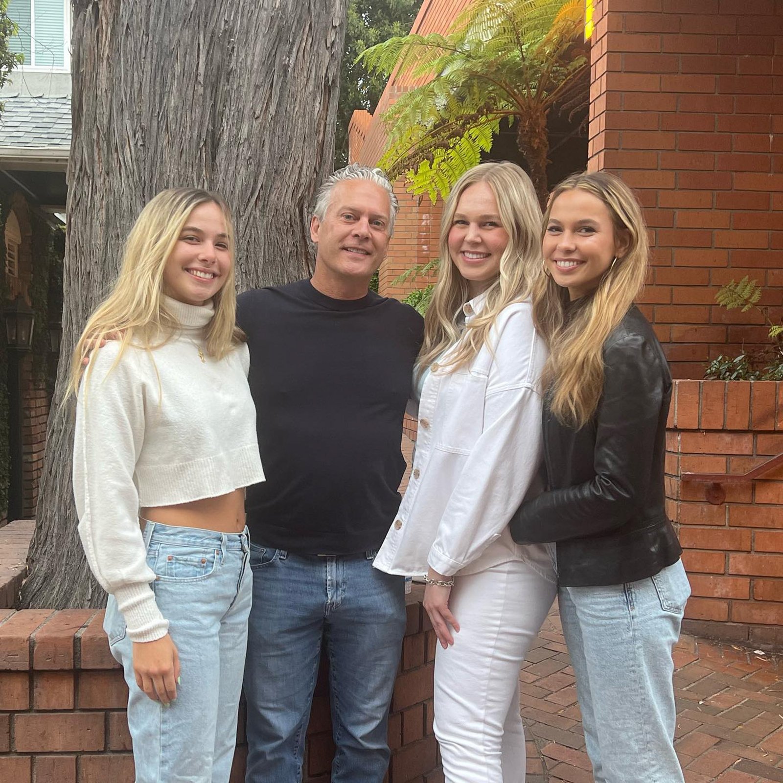 David Beador poses with three daughters