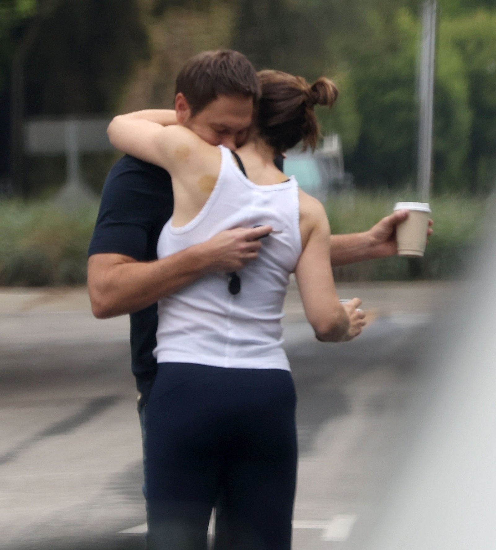 Jennifer Garner and John Miller hugging.