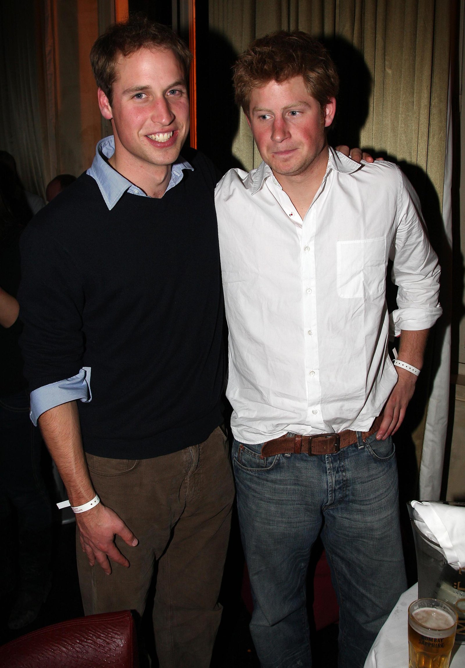 Prince WIlliam and Prince Harry posing for a photo together 