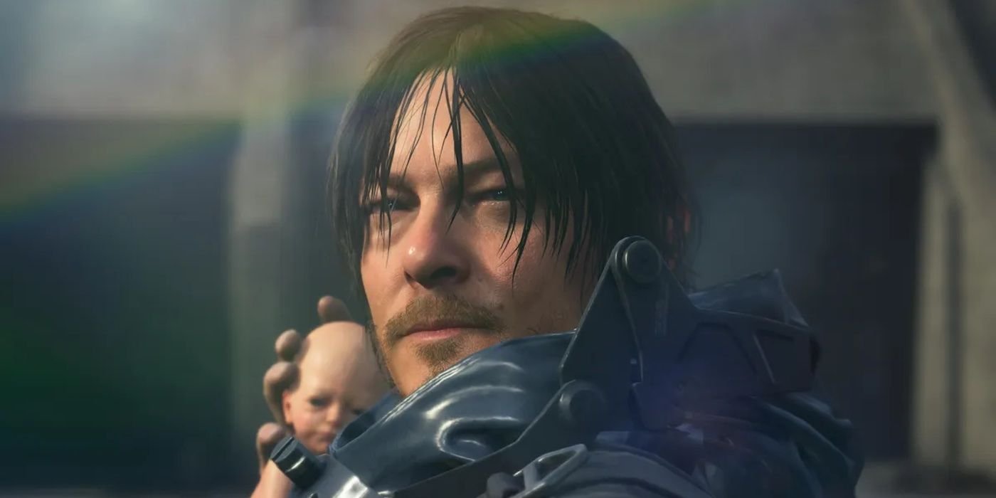 Norman Reedus holding a baby in Death Stranding.