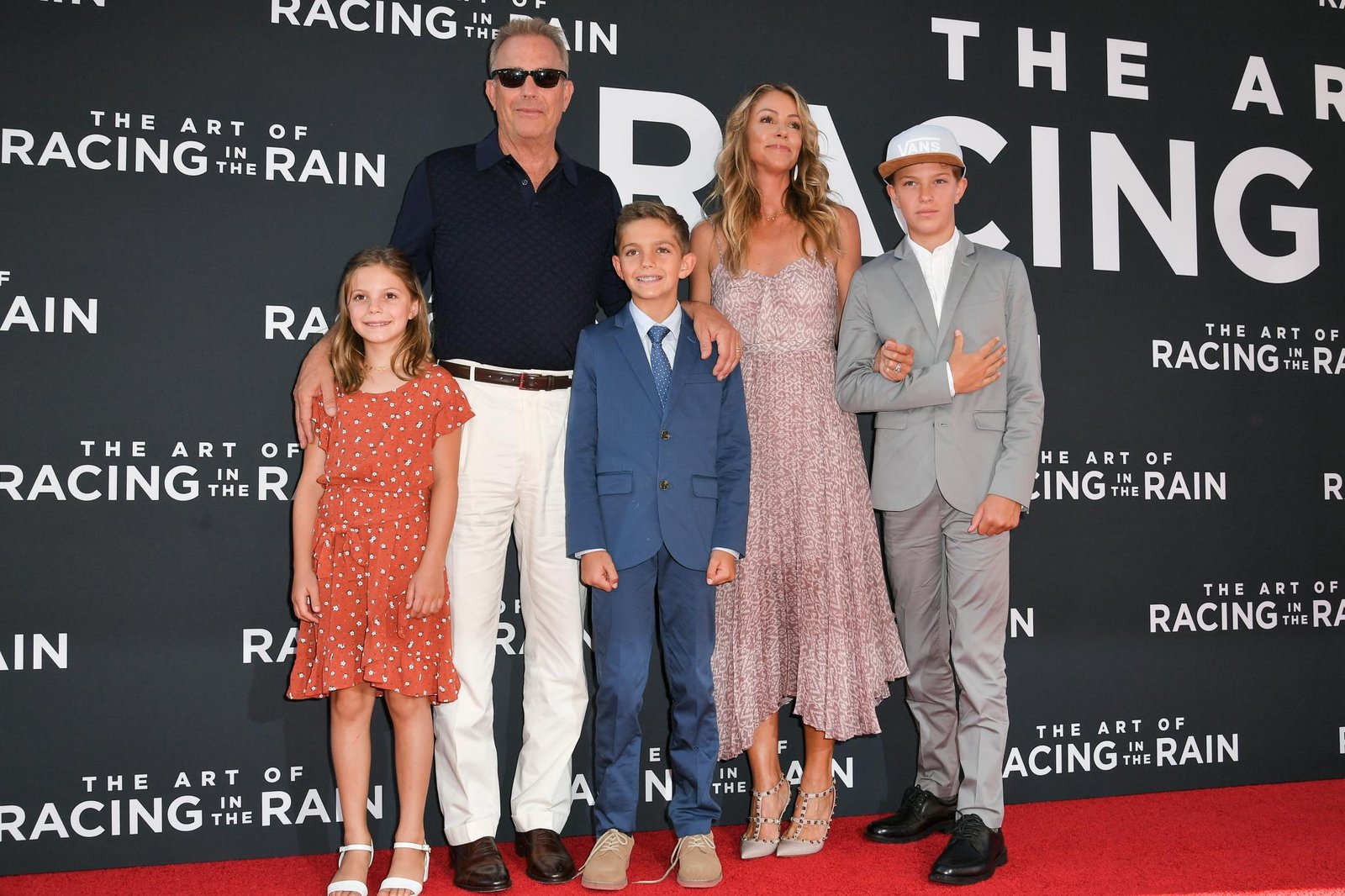 Kevin Costner, Christine Baumgartner and their kids.