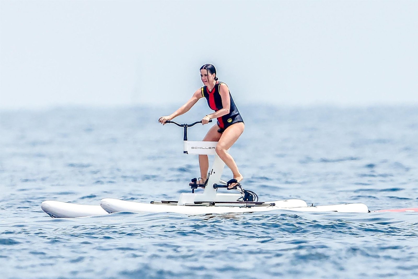Katy Perry on a water bike