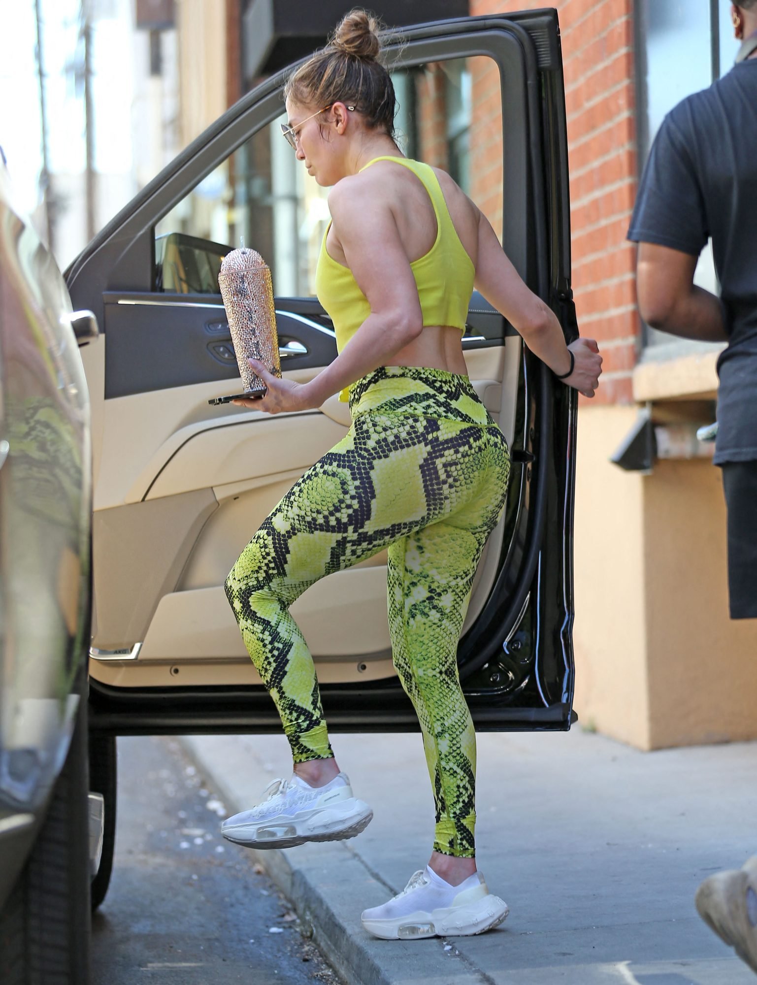 After her sweat session, she was seen exiting the premises as paps waited for her to get into a waiting SUV.