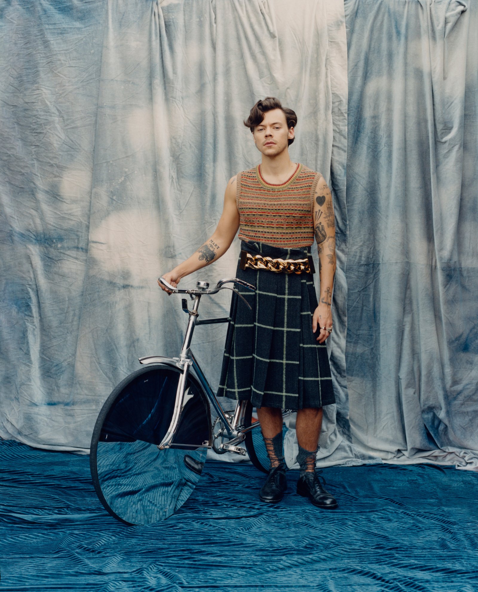 Harry Styles in a kilt for Vogue.