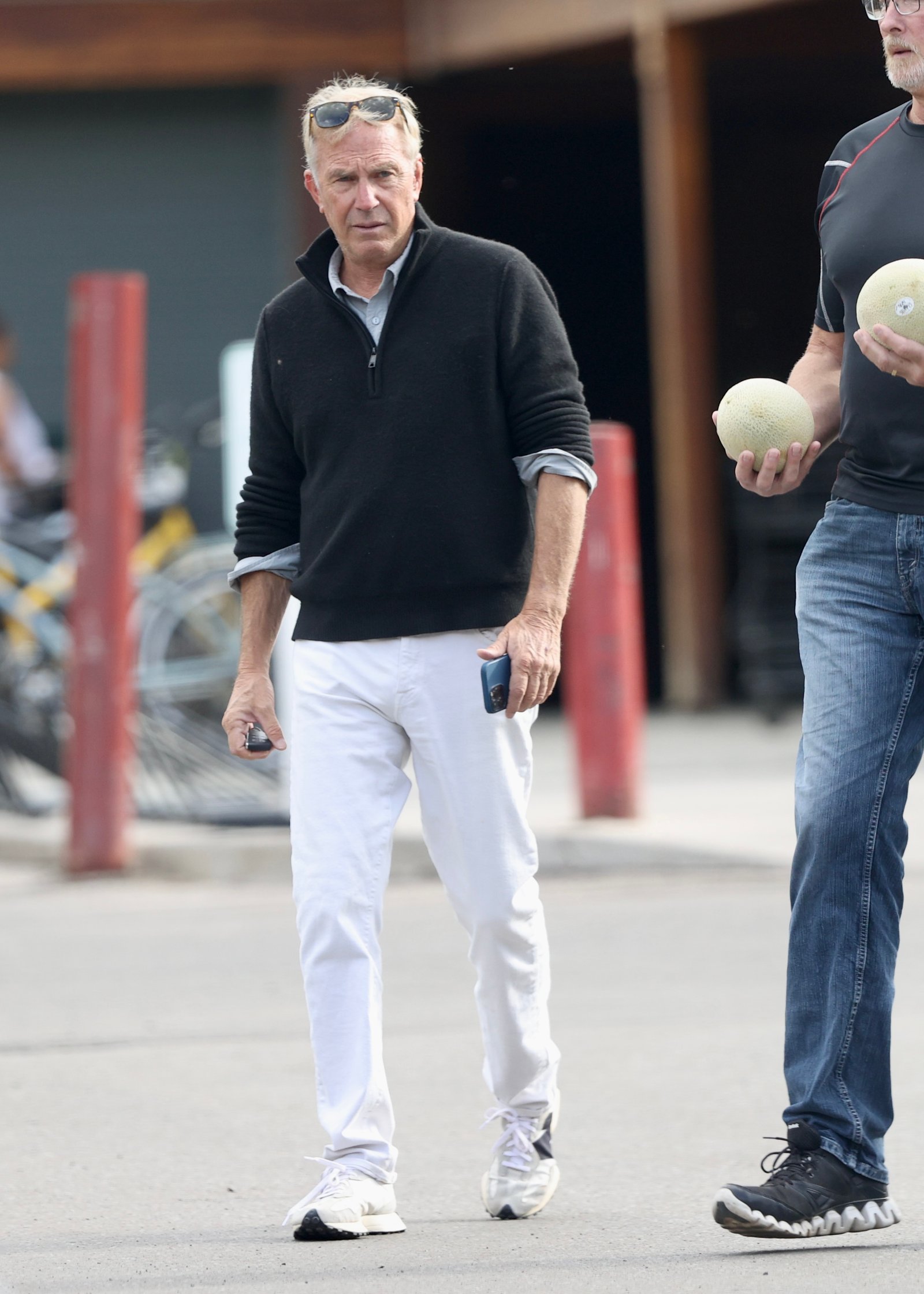 Kevin Costner out in Aspen with his bodyguards.
